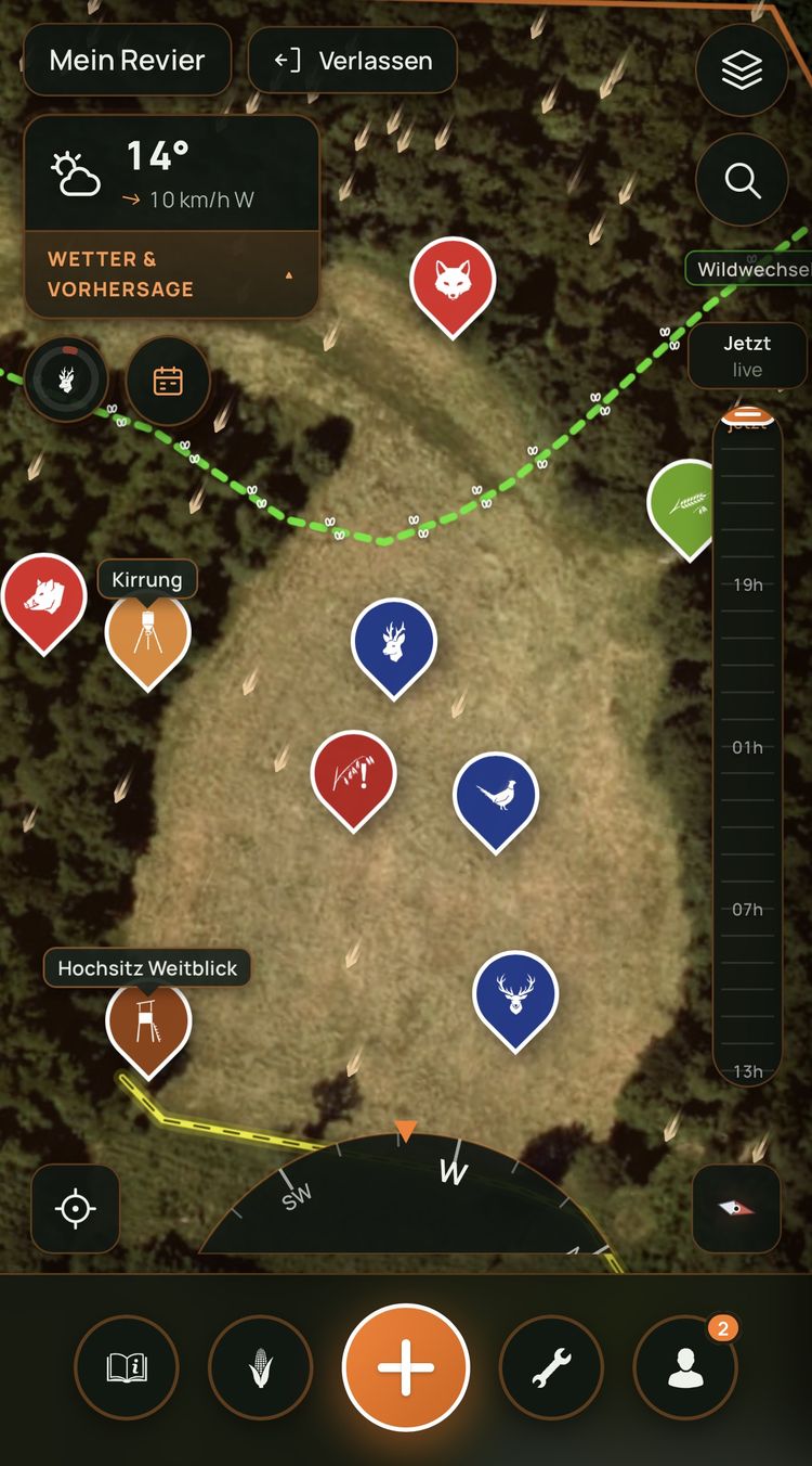 Screenshot der JagdBasis Jagdmap am Handy: Satellitenkarte eines Reviers mit Hochsitz, Kirrung, Wildwechsel und Wild-Markern, oben links das Wetter mit 14 Grad und Wind aus West